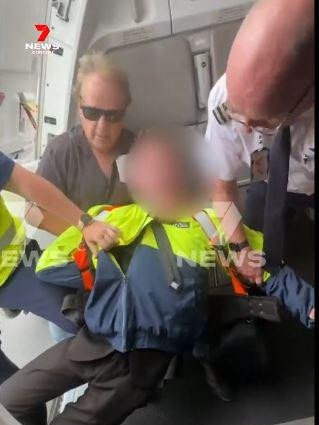 A teen, allegedly armed with a gun, was apprehended on a passenger jet at Avalon Airport. Picture: Channel 7