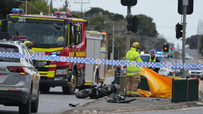 Paramedics, police and MFS crews were called to a crash, believed to be between a car and a motorcycle. Picture: Dean Martin