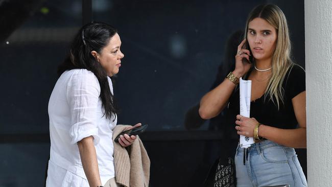 O’Brien (left) speaking with Murray (right) outside court in July.