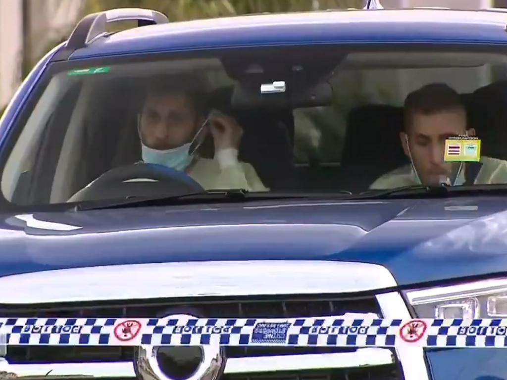 Police outside the Green Valley the mother of Roni and Ramsin Shawka after she died due to Covid-19. Picture: 9 News.