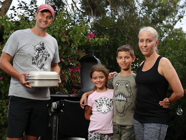 Hornsby Heights family Marc and Dominique Middlecote with their children Luc, 10, and Layla, 7, are cooking meals on their BBQ. Picture: Jonathan Ng