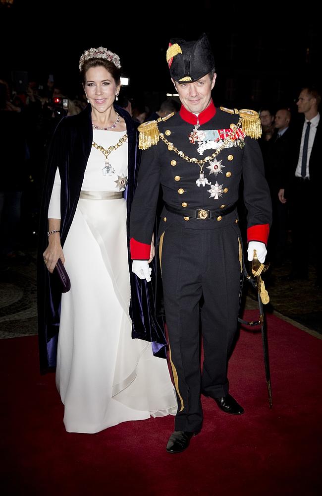 <p>It&rsquo;s all white ... Crown Princess Mary of Denmark and Crown Prince Frederik of Denmark attend a New Years Levee and Banquet at Christian VII&rsquo;s Palace on January 1, 2015. Picture: Getty</p>