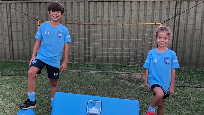 Former Socceroo and Sydney FC coach Paul Reid stars in backyard tips videos along with his 11-year old son Aston and 7-year old daughter Avery.