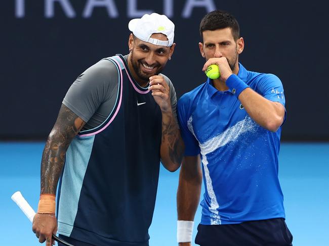 BRISBANE, AUSTRALIA - JANUARY 01: Novak Djokovic and Nick Kyrgios talks tactics during their doubles match against Michael Venus and Nikola Mektic during day four of the 2025 Brisbane International at Pat Rafter Arena on January 01, 2025 in Brisbane, Australia. (Photo by Chris Hyde/Getty Images)