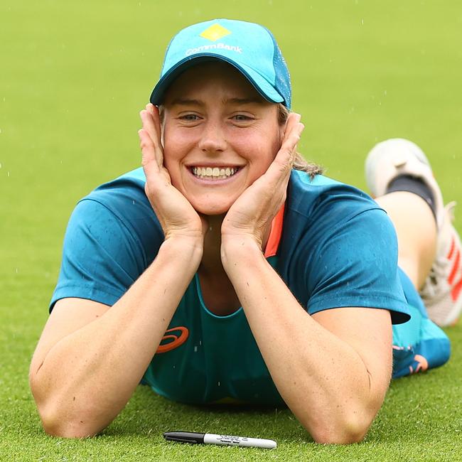 Ellyse Perry has her photo taken by a team mate after game three of the International T20 series between Australia and Pakistan at Manuka Oval in January this year. Picture: Getty Images