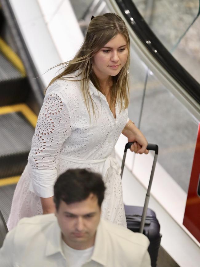 Brittany Higgins and her fiance David Sharaz depart Brisbane international Airport bound for France. Picture: Backgrid/news.com.au