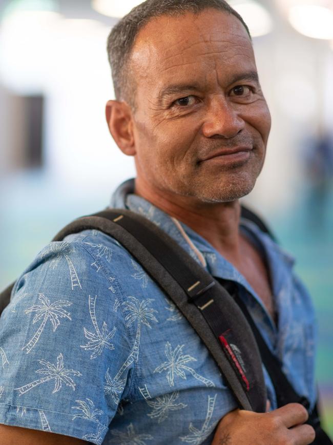 Darwin received its first arrivals from interstate as further border restrictions are lifted. Micah Daniels arrived back in the Territory for the first time in 10 years. Picture: Che Chorley