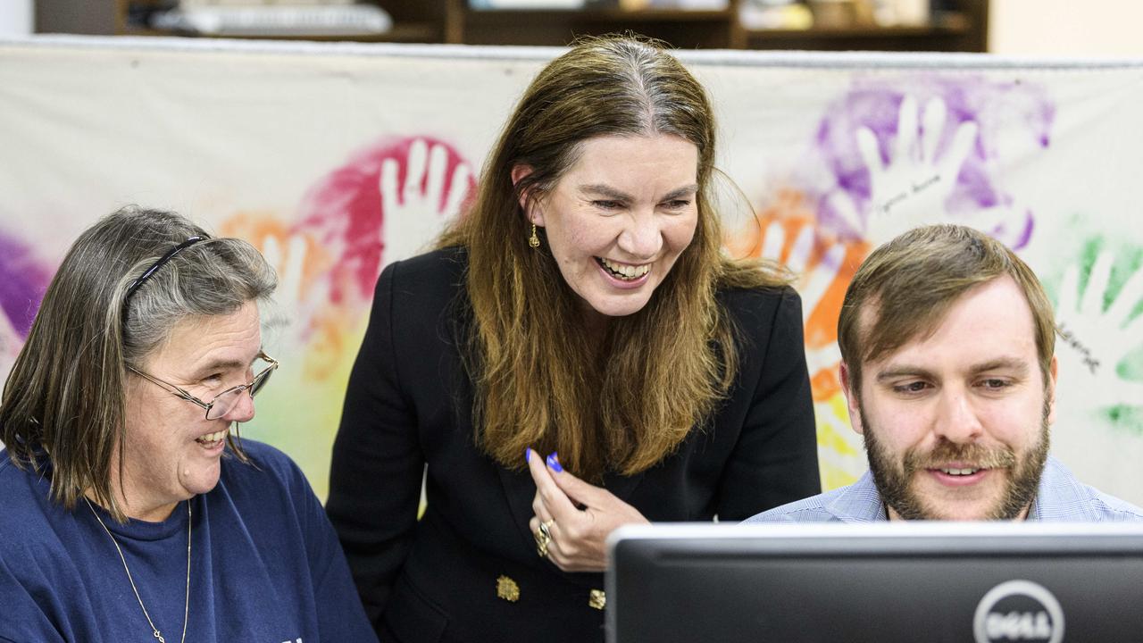 Groom Independent Suzie Holt (centre) looks over early numbers with Penelope Lilford and Thomas Murphy at campaign headquarters on federal election night. Picture: Kevin Farmer