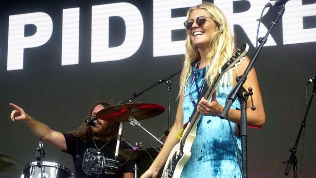 Stephanie Gilmore performs with Spiderbait at the Falls festival at Byron Bay. Picture Luke Sorensen/ Liquify Magazine.