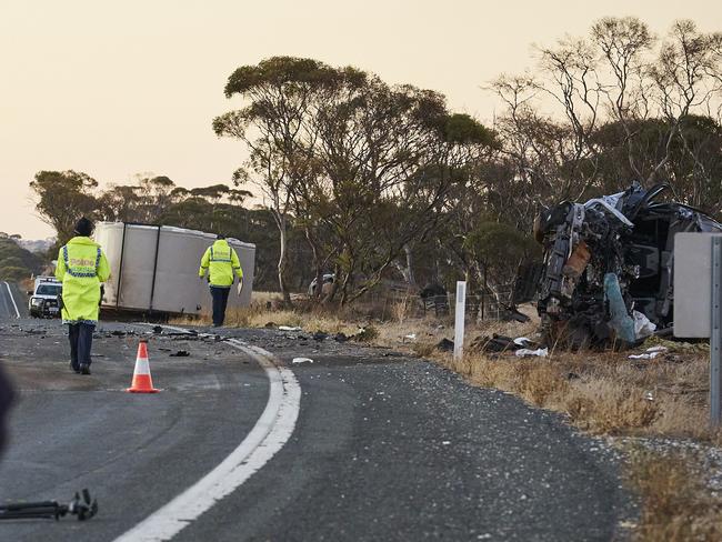 One dead in horror head-on as truck, two cars collide
