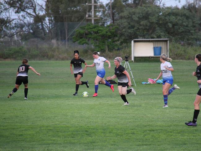 The Bluebirds and Central FC battle for possession in the inaugural CQ Women's Premier League match at Brian Niven Park. Central FC won the game 6 - 3.