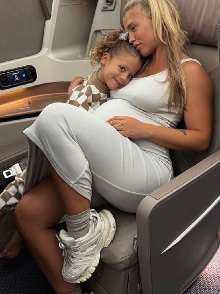 Tammy Hembrow has hit back at critics who questioned this photo about why she flew overseas 32 weeks pregnant.