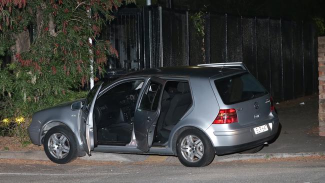 Police have arrested a male after a Volkswagen Golf was chased to a carpark next to Yagoona Railway Station. Picture: Bill Hearne