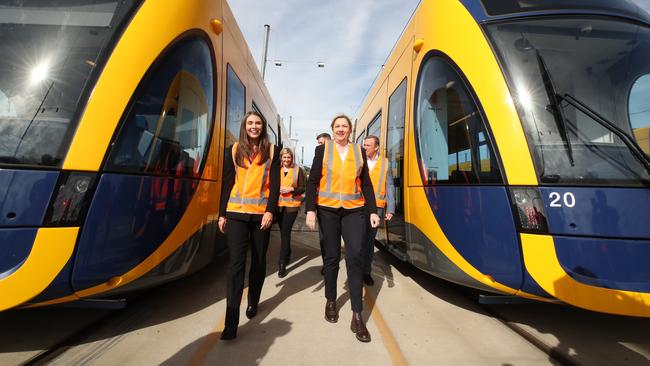 Premier Annastacia Palaszczuk (front right) with member for Gaven Meaghan Scanlon and other ministers welcome five new G:Link trams to the Gold Coast on Monday. Picture: Glenn Hampson