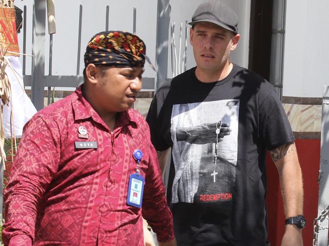 Bali Nine member Matthew Norman walks out from his tower cell after the Indonesia's Independence Day in Bali. Picture. Lukman S. Bintoro