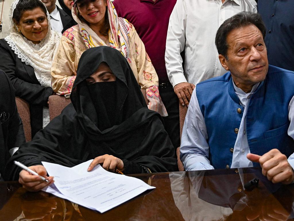 Pakistan's former prime minister Imran Khan with his wife Bushra Bibi. Picture: AFP