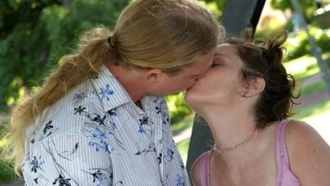 Mel and her husband on their wedding day.