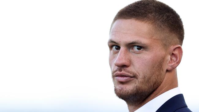 Kalyn Ponga looks on as his Knights teammates warm up prior to the round seven NRL match between Newcastle and Penrith at McDonald Jones Stadium. Picture: Getty Images