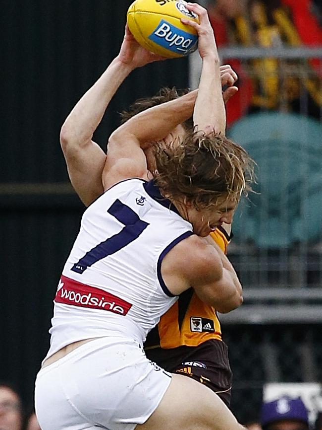 Nat Fyfe was fined for this spoil on Hawk Taylor Duryea. Picture: Wayne Ludbey