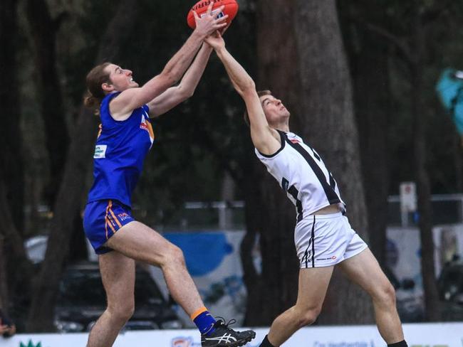 Fin Brown flies for a mark in the Eastern Football League (EFL) for Heathmont. Picture: Davis Harrigan