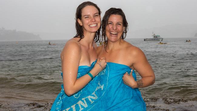 Big smiles after swimming in the harbour. Picture: Jordan Shields