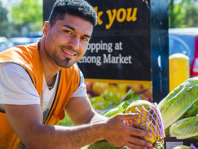 #SNAPMELBOURNE Theme: How our city wakes up. Dandenong Market. Mohamad Ranjbar from Lupino Fresh with some fruit and vegetables. Picture: Valeriu Campan