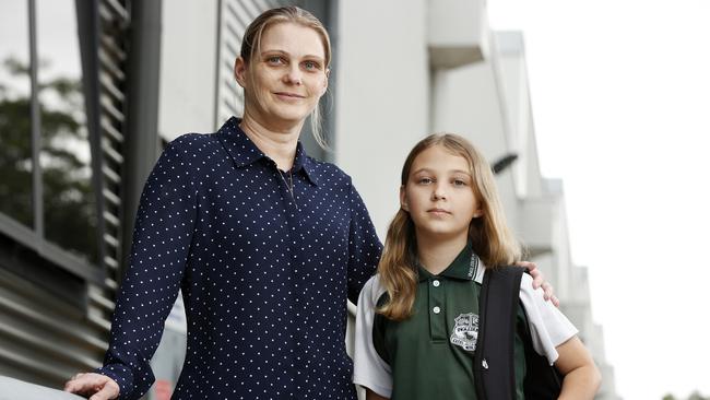 Sharan Baker with her daughter Emma, 11. Sharan will have to take the day off work on Tuesday due to a teachers’ strike. Picture: Jonathan Ng