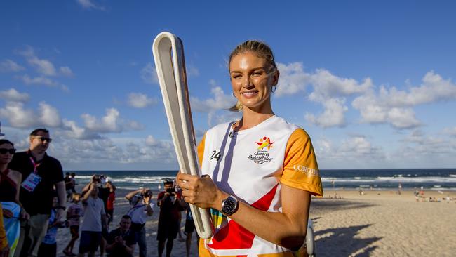 Amy Pejkovic’s role in this year’s Commonwealth Games has been restricted to carrying the Queen’s baton after she suffered a knee injury. Picture: Jerad Williams