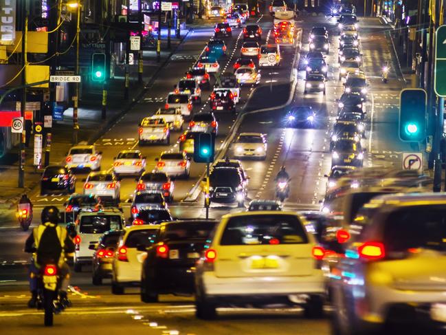 Typically heavy traffic on Parramatta Road, Sydney at dusk.