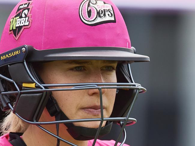 SYDNEY, AUSTRALIA - NOVEMBER 17: Ellyse Perry of the Sixers looks on during the Women's Big Bash League match between the Sydney Sixers and the Melbourne Renegades at Drummoyne Oval on November 17, 2019 in Sydney, Australia. (Photo by Brett Hemmings/Getty Images)