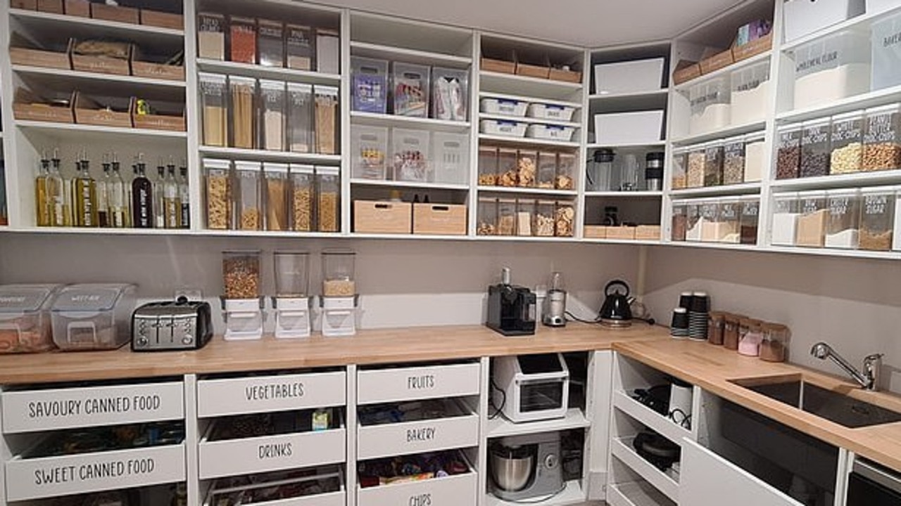 The pantry seems to be arranged into different categories on separate shelves, including pasta, oils and vinegar, cereal, spreads, breakfast food, bread, snacks and spices. Picture: Facebook/Mums Who Organise