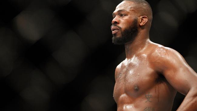 LAS VEGAS, NV - JANUARY 03: Light heavyweight champion Jon Jones waits in a time-out as he defends his title against Daniel Cormier during the UFC 182 event at the MGM Grand Garden Arena on January 3, 2015 in Las Vegas, Nevada. Jones retained his title by unanimous decision. Steve Marcus/Getty Images/AFP == FOR NEWSPAPERS, INTERNET, TELCOS & TELEVISION USE ONLY ==