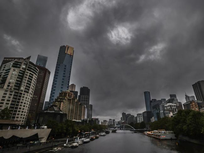 Storm clouds cloak Melbourne into the dark and wet conditions.                      Picture: David Caird