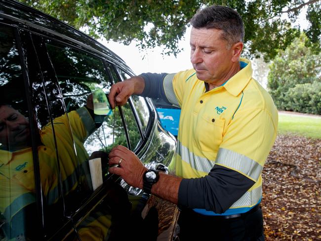 SYDNEY, AUSTRALIA - NewsWire Photos DECEMBER 3, 2024: NRMA Patrol member Tony Tamine unlocks a car on Tuesday. As hot summer temperatures continue the NRMA warns of the dangers of locking children and pets in cars. Picture: NewsWire / Nikki Short