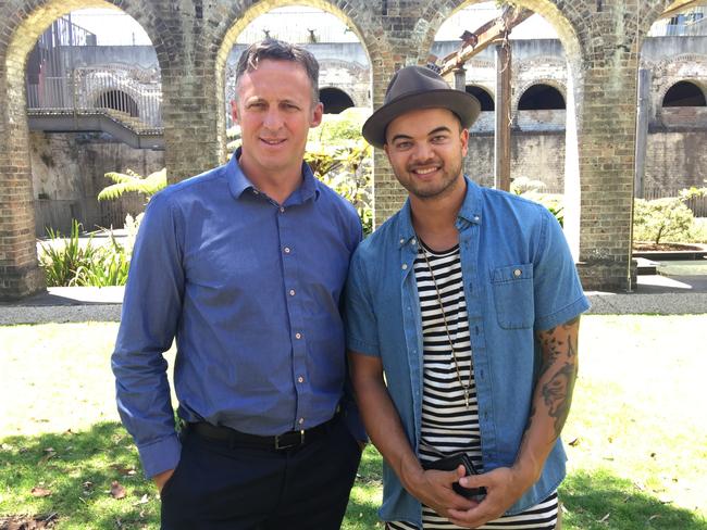 Titus Day, left, the former manager of singer Guy Sebastian, is heading to trial over allegations he embezzled royalties and performance fees.