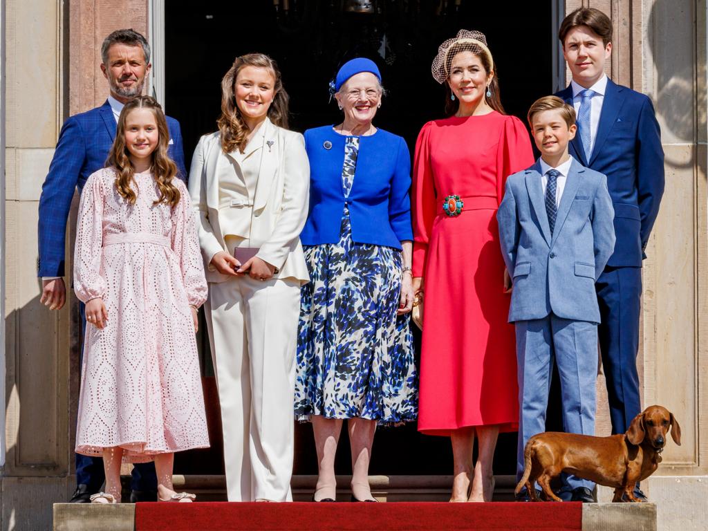 The family - including their sausage dog - pose on the steps of Fredensborg Palace to mark the confirmation of Princess Isabella. Picture: Patrick van Katwijk/Getty Images