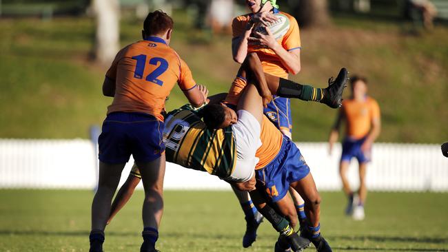 Ashgrove's Dwayne Ludwick pictured tackling during the Ashgrove v St Patrick's College Rugby Union Firsts, Marist College, Brisbane 11th of May 2019. (AAP Image/Josh Woning)