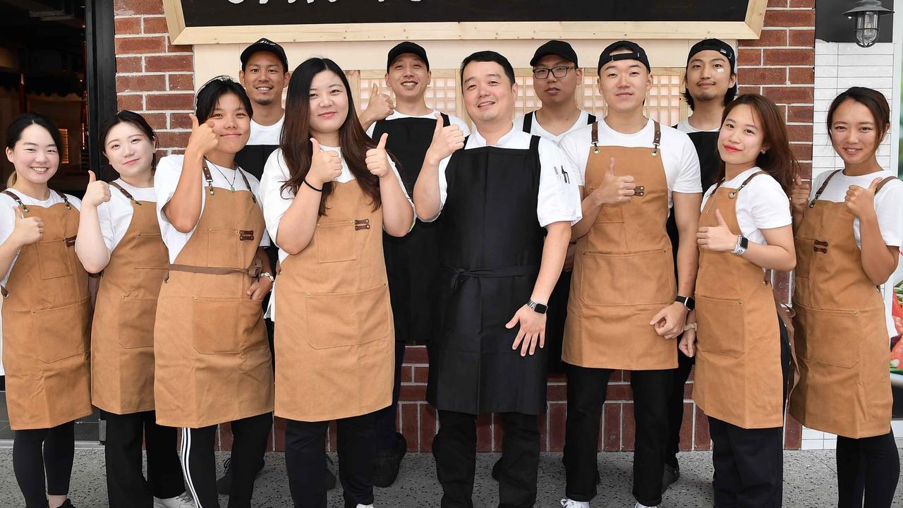 Jango Korean BBQ managers Kihoon Nam and Aram Lee pictured with staff members. Picture: Patrick Woods