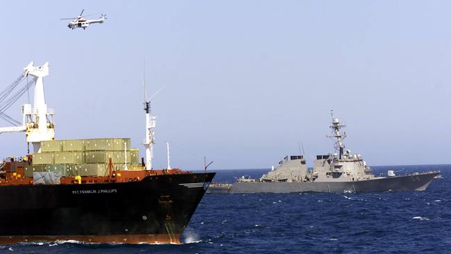 USS Curtis Wilbur, right, during a joint exercise off central Queensland, Operation Pacific Protector. Picture: Graham Crouch