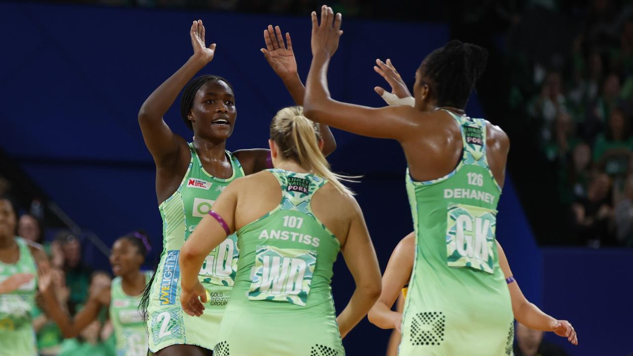 Sunday Aryang of the Fever high fives her teammates during the Super Netball Minor Semi Final match between West Coast Fever and Sunshine Coast Lightning at RAC Arena, on July 21, 2024, in Perth, Australia. (Photo by James Worsfold/Getty Images)