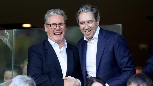 British Prime Minister Keir Starmer and Irish counterpart Simon Harris in the stands during the UEFA Nations League football match between Ireland and England at Aviva Stadium, in Dublin, on Saturday. Picture: AFP