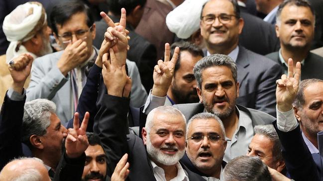 Ismail Haniyeh, lower centre, at the swearing in of Iran's new President, Masoud Pezeshkian, at the parliament in Tehran on July 30, the day before he was assassinated. Picture: Majid Asgaripour/WANA (West Asia News Agency) via Reuters