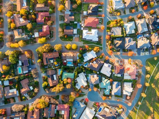 Typical Australian suburb from above in autumn; housing overhead generic