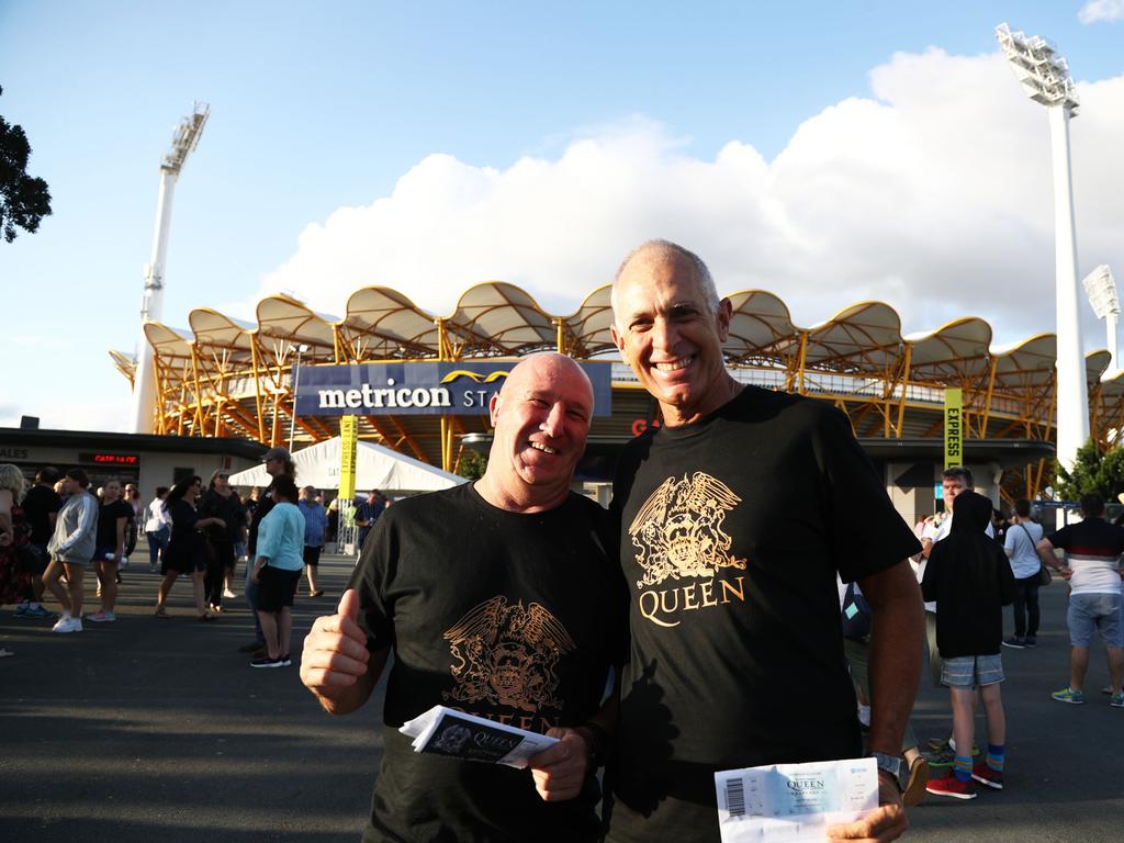 Eddie Smith and Kim Brown arrive at Metricon Stadium to see Queen Live. Photograph: Jason O'Brien