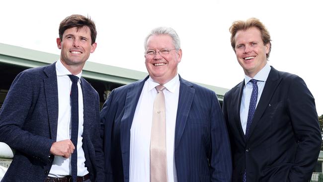 Anthony Cummings flanked by sons James (left) and Edward (right) Picture: Tim Hunter.