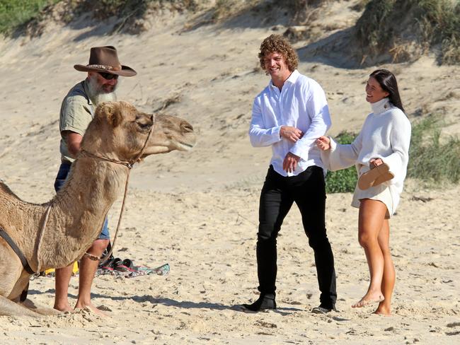 Hump day: They met camels on the beach. Picture: Nathan Edwards