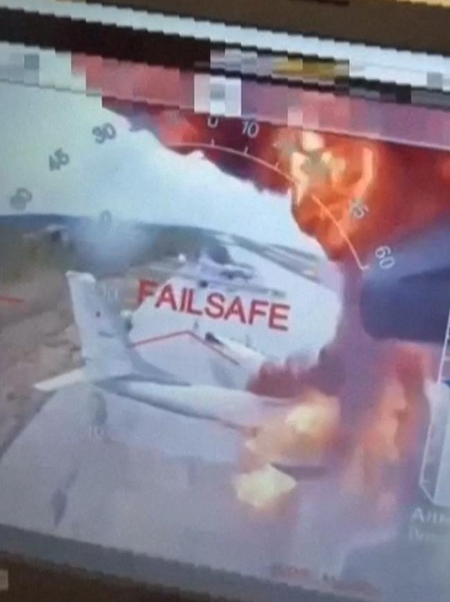 This picture grabbed from a video released by the Ukrainian secret service shows what it says are several aircraft on fire on Belaya Air Base in eastern Siberia. Picture: AFP