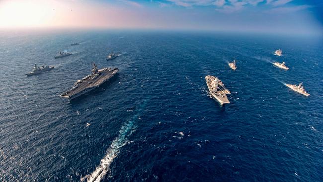 Ships from India, Australia, Japan and the US take part in military exercises. Picture: AFP