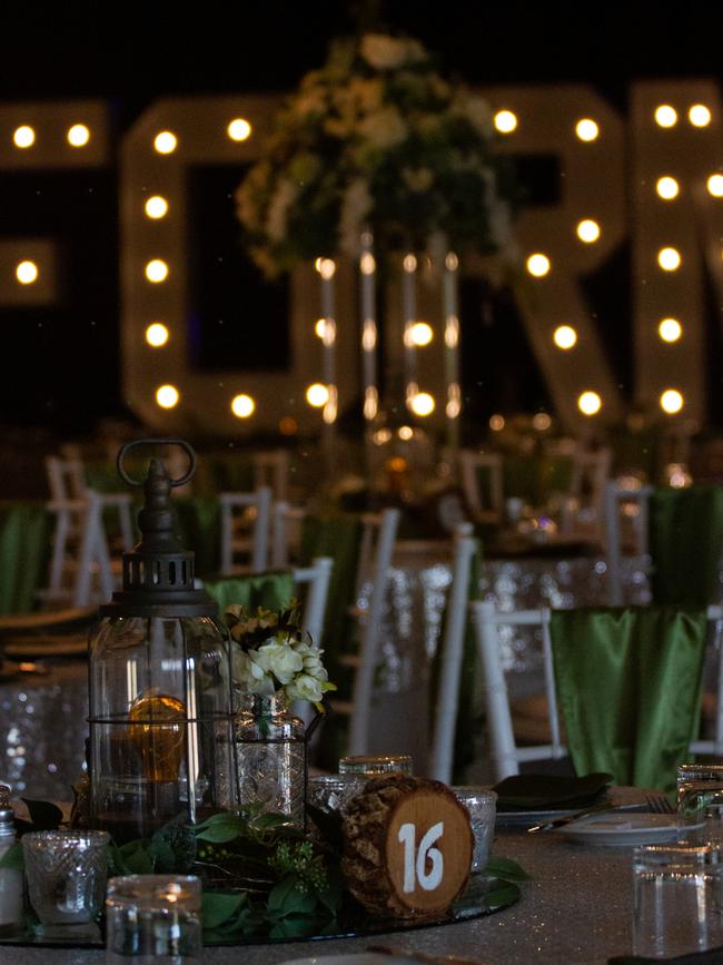 Candlelights created a warm glow in the ballroom.