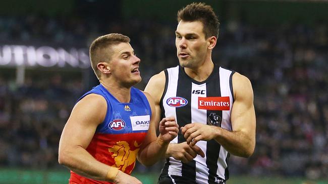 Dayne Zorko clashes with Collingwood tagger Levi Greenwood last season. Picture: Scott Barbour/Getty Images.